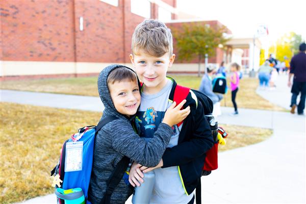 Students walking to school for National Walk to School Day.
